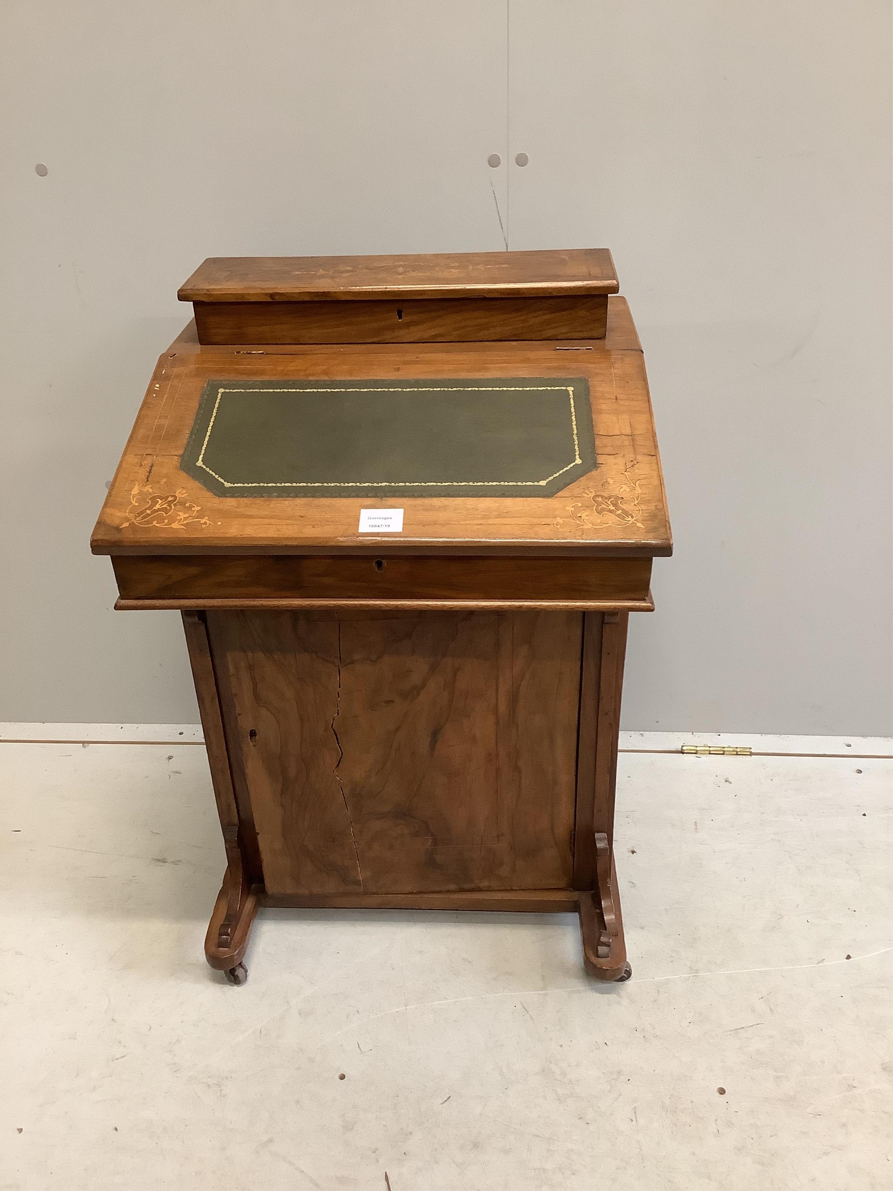 A late Victorian inlaid walnut Davenport, width 53cm, depth 49cm, height 82cm. Condition - poor to fair